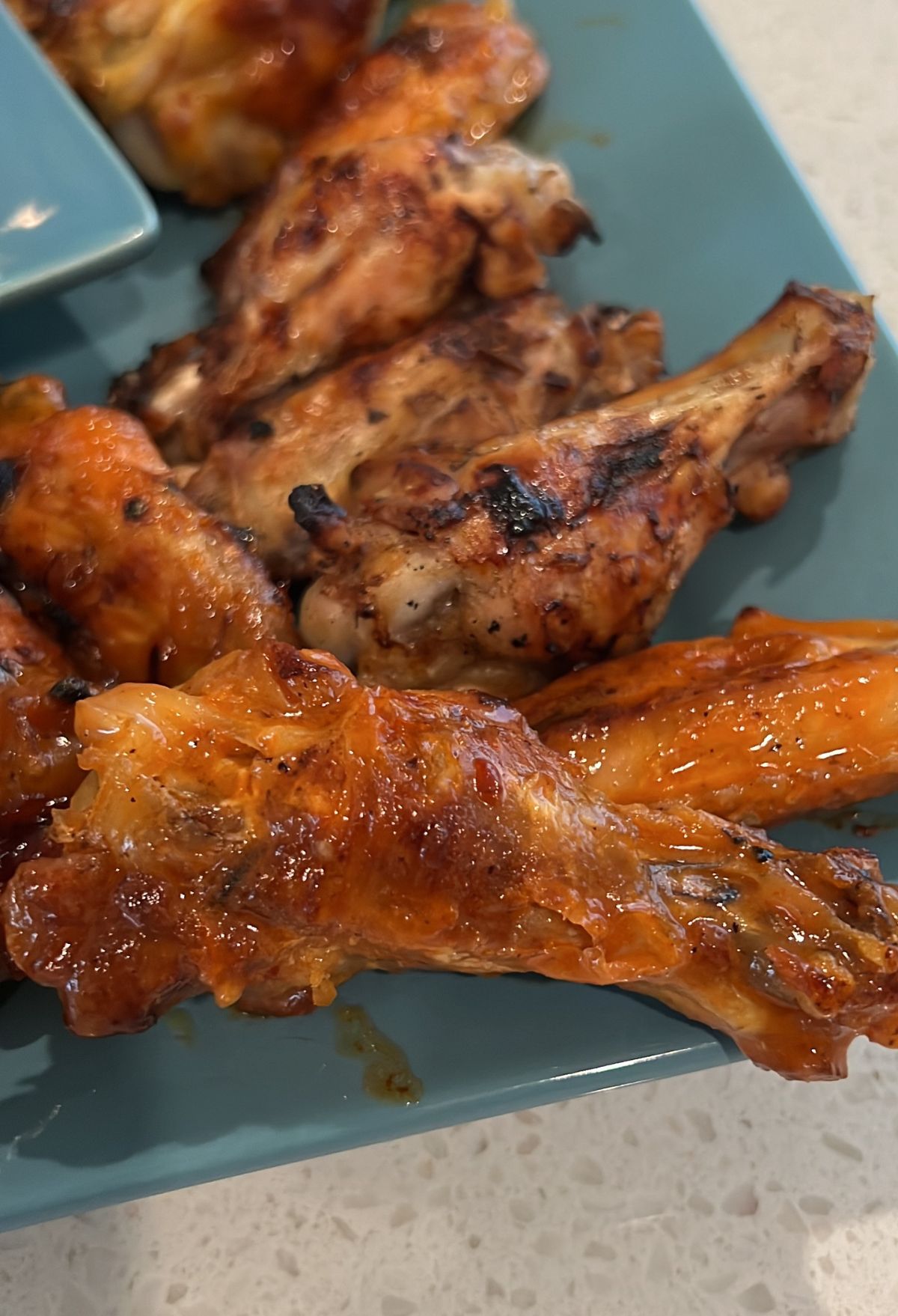 https://bestblackstonerecipes.com/wp-content/uploads/2022/12/Mastering-How-to-Cook-Wings-on-Blackstone-Griddle-3.jpg