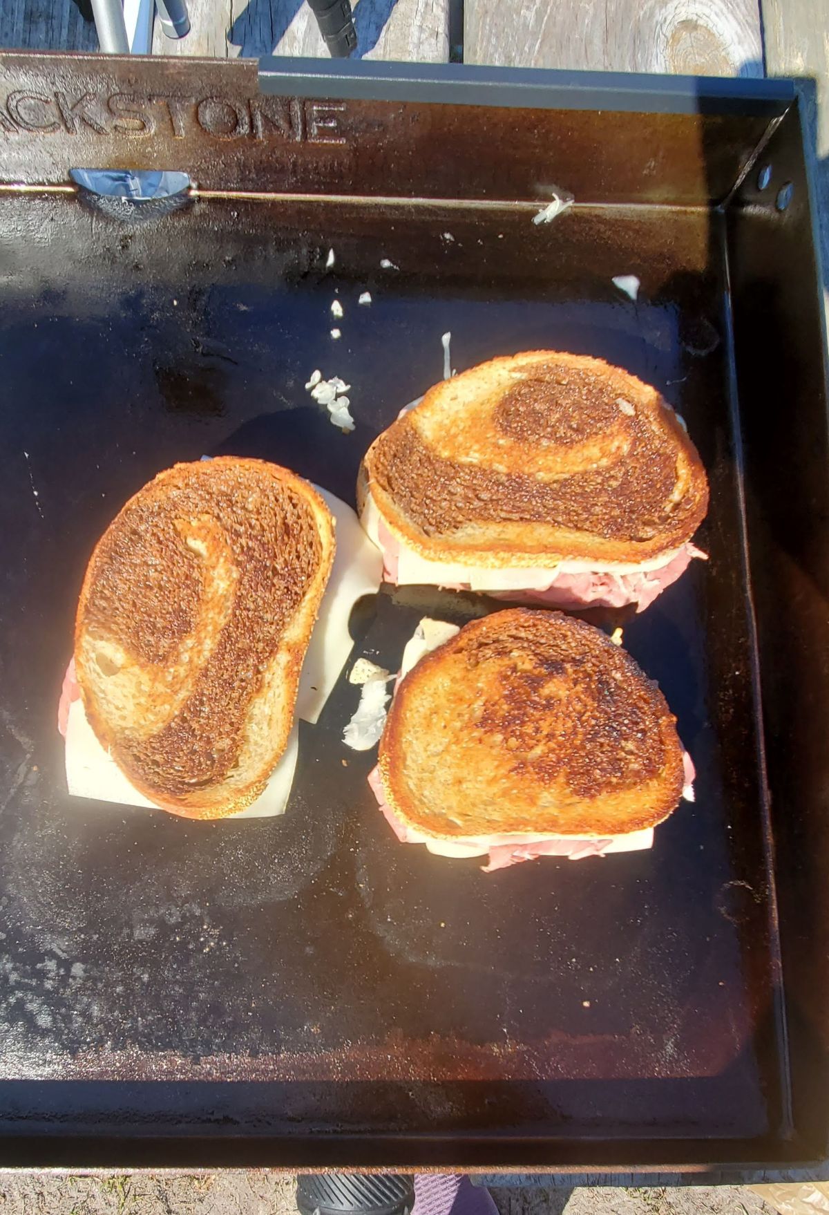 corned beef reuben sandwich on a blackstone griddle