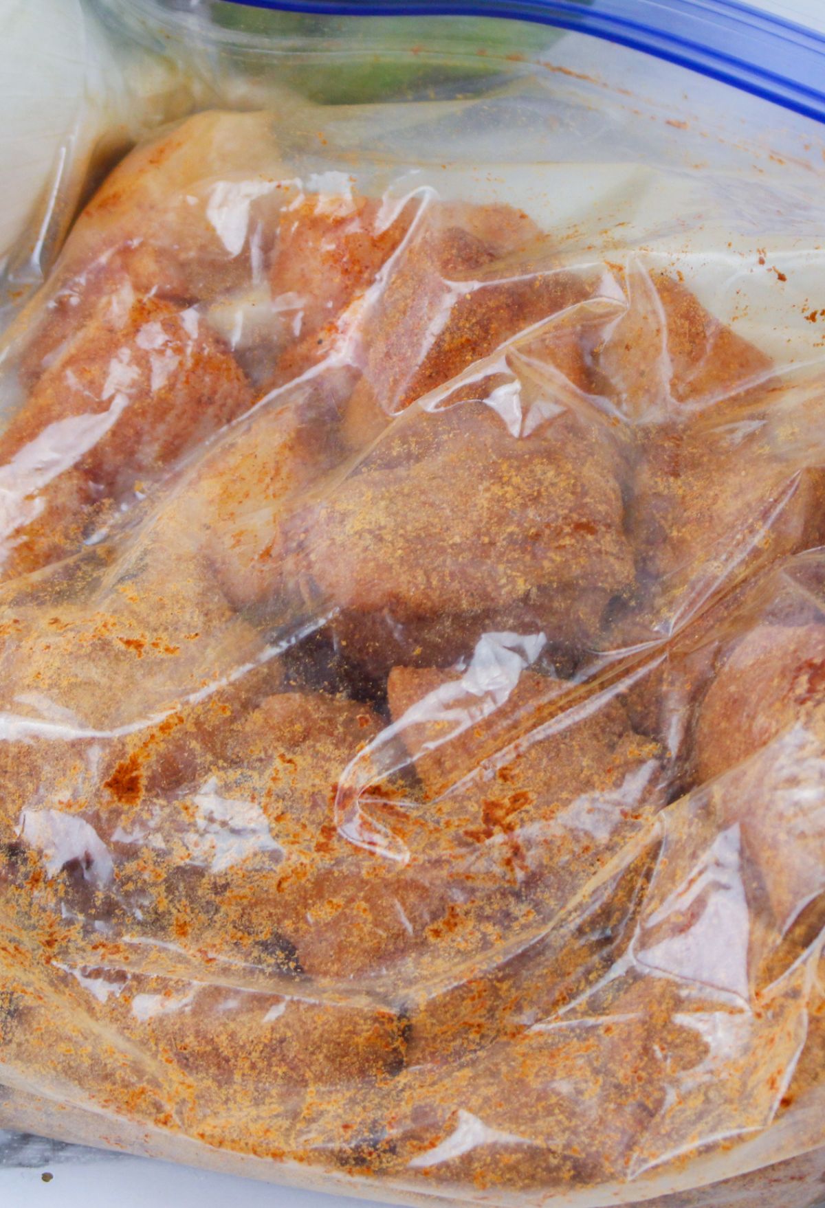 A bag of chicken in a plastic bag.