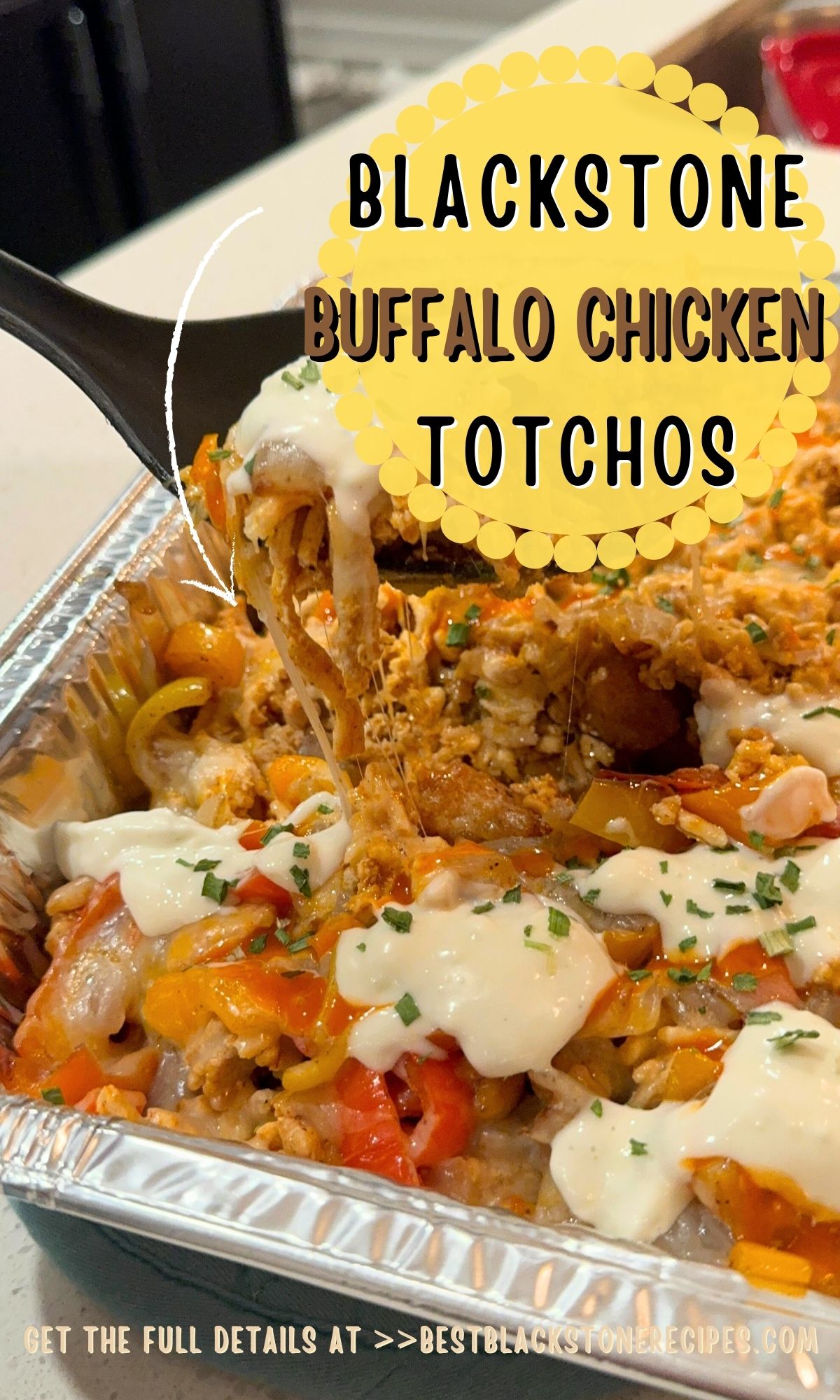 A serving spoon scoops buffalo chicken totchos from a foil tray, topped with melted cheese and diced vegetables, with caption and website details overlaid.